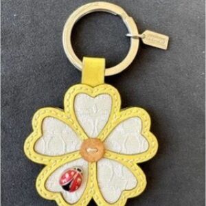 Coach Floral Keychain with Yellow and White Petals